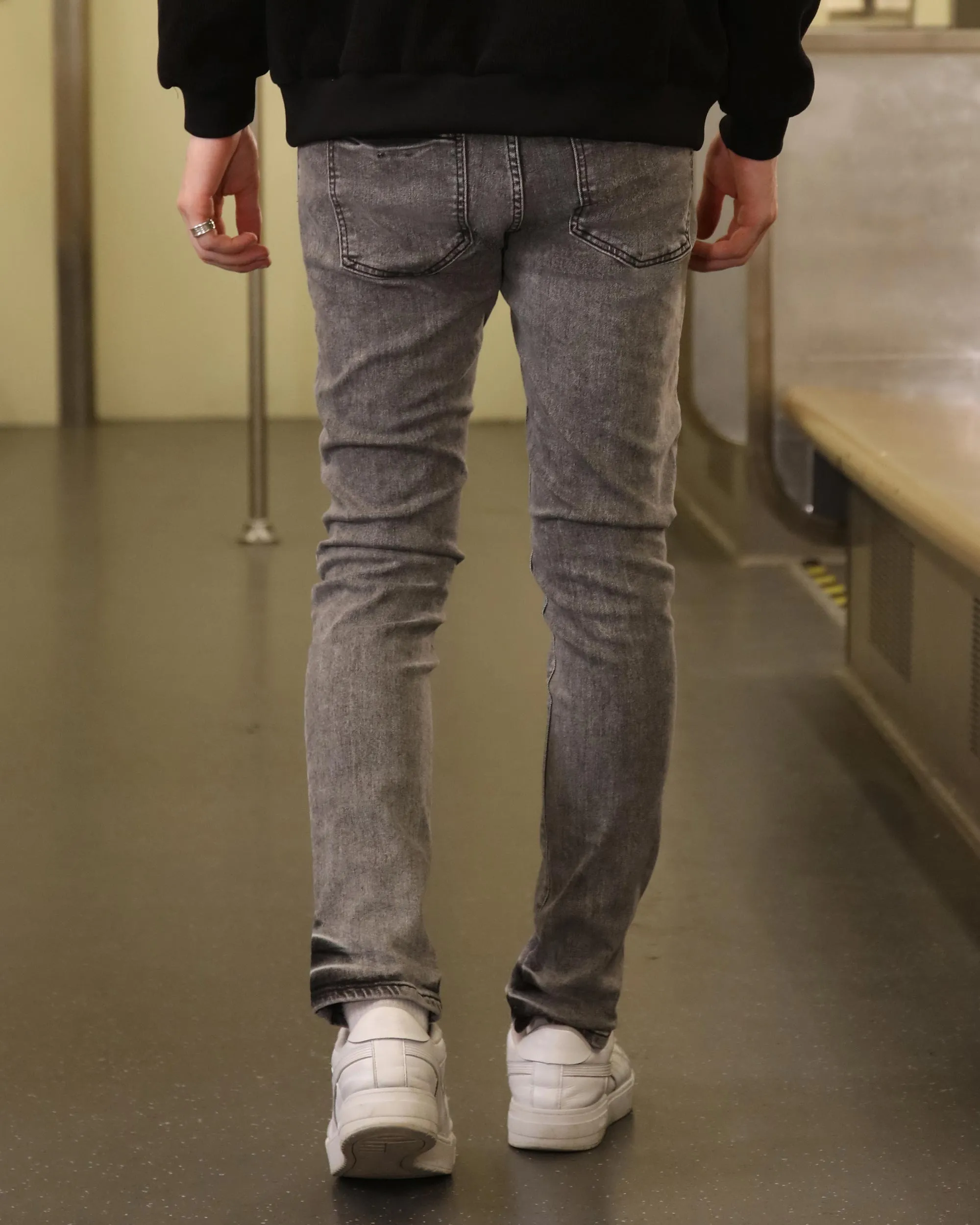 Gray Ripped Jeans with Graffiti-Inspired Style