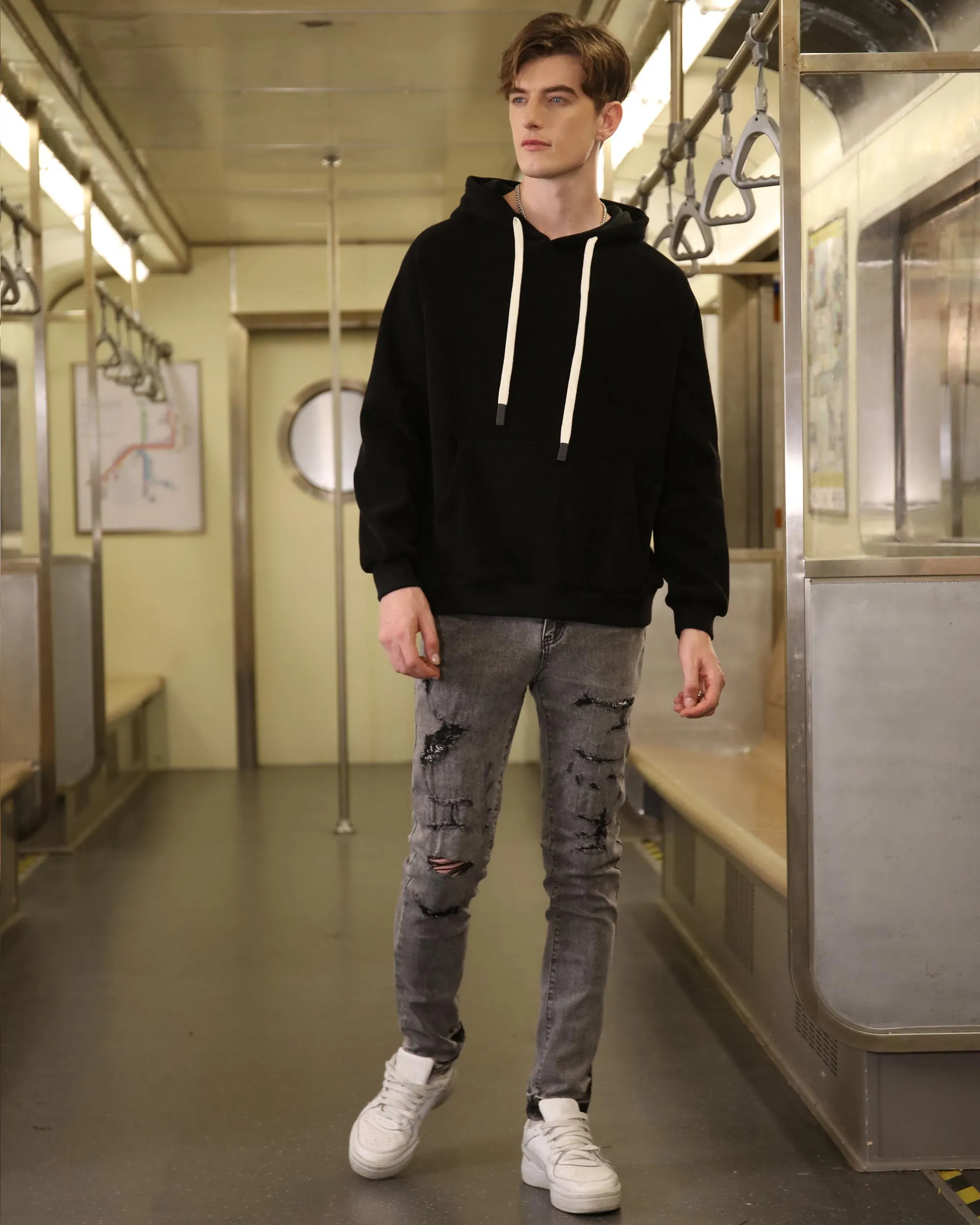 Gray Ripped Jeans with Graffiti-Inspired Style