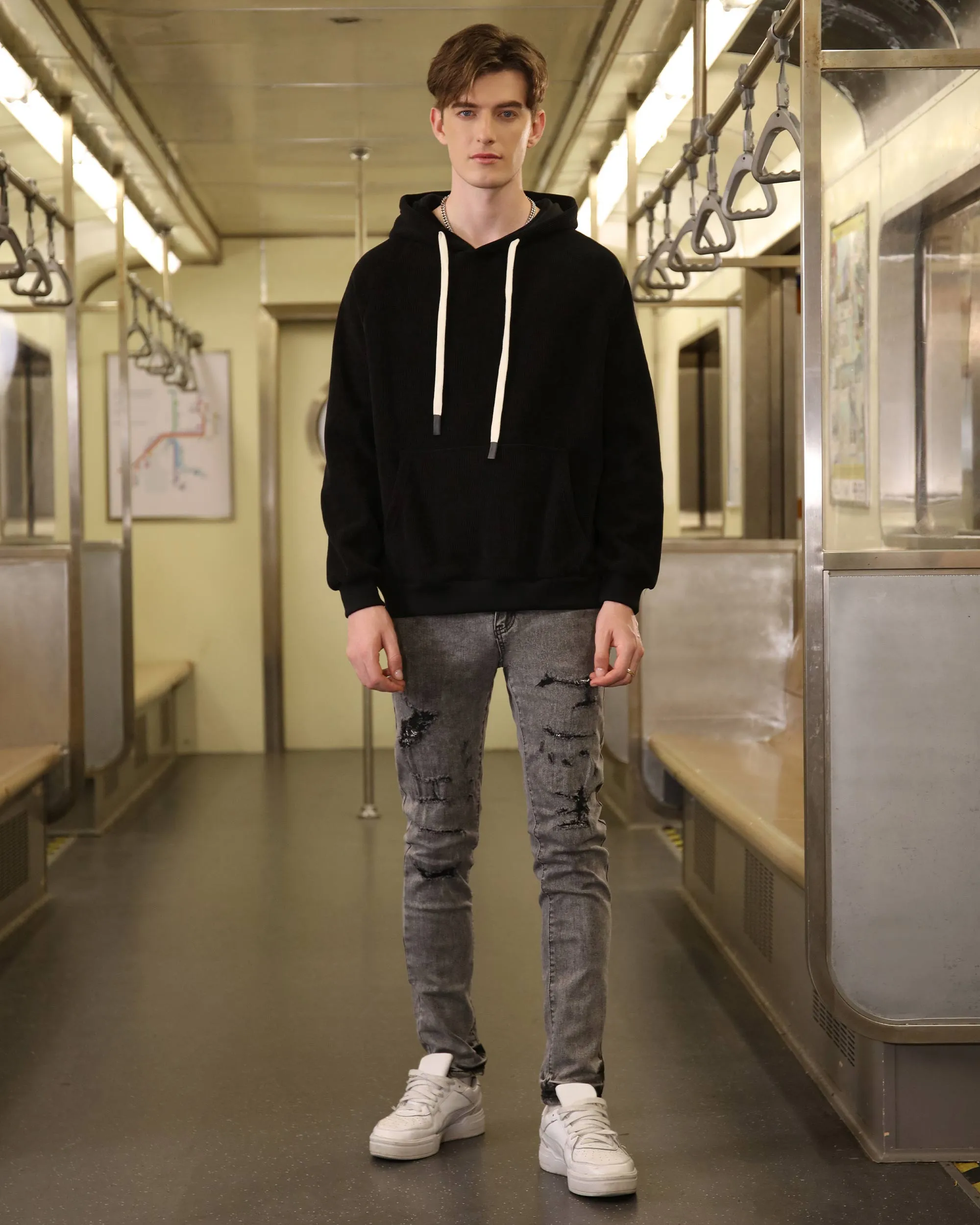 Gray Ripped Jeans with Graffiti-Inspired Style