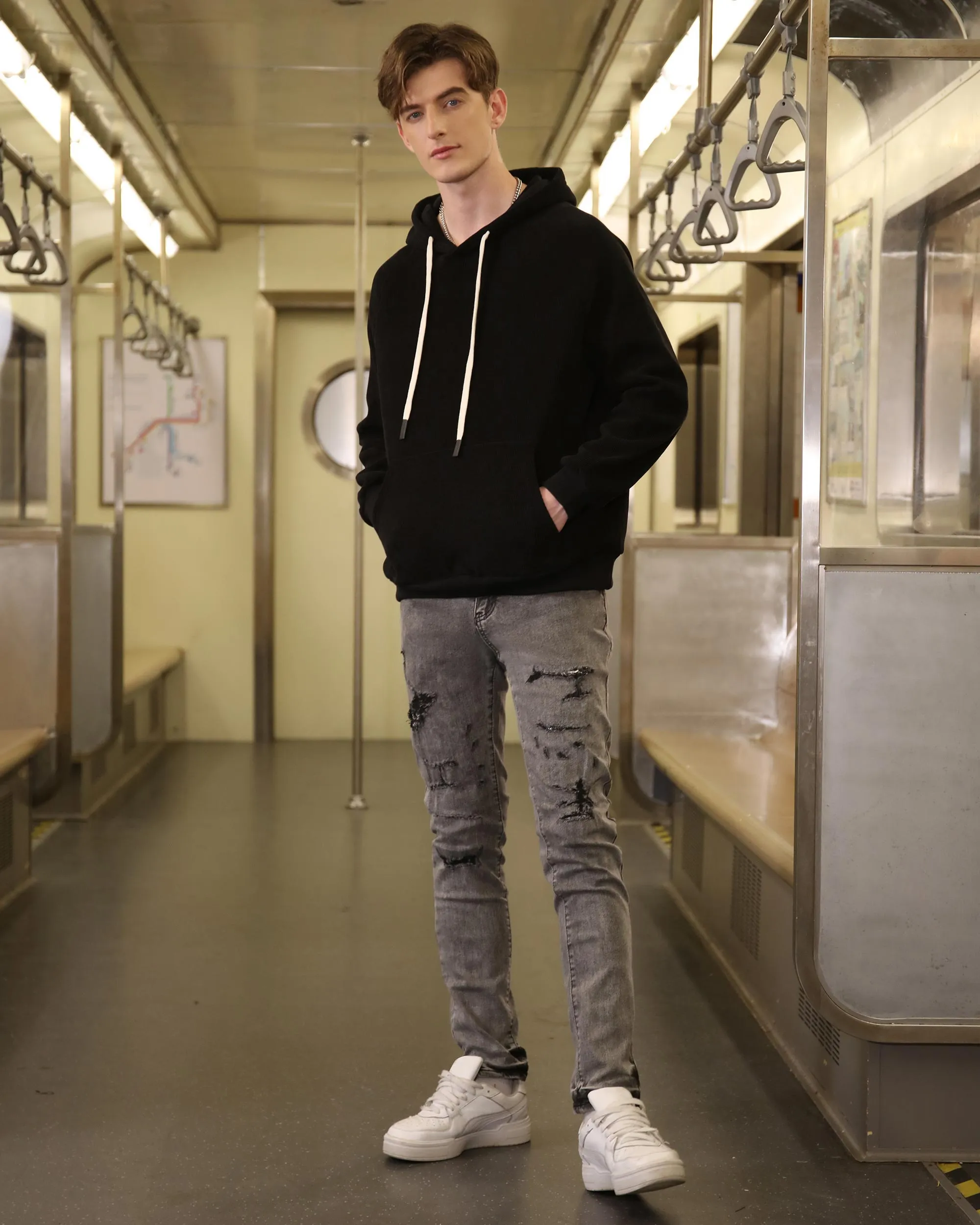 Gray Ripped Jeans with Graffiti-Inspired Style