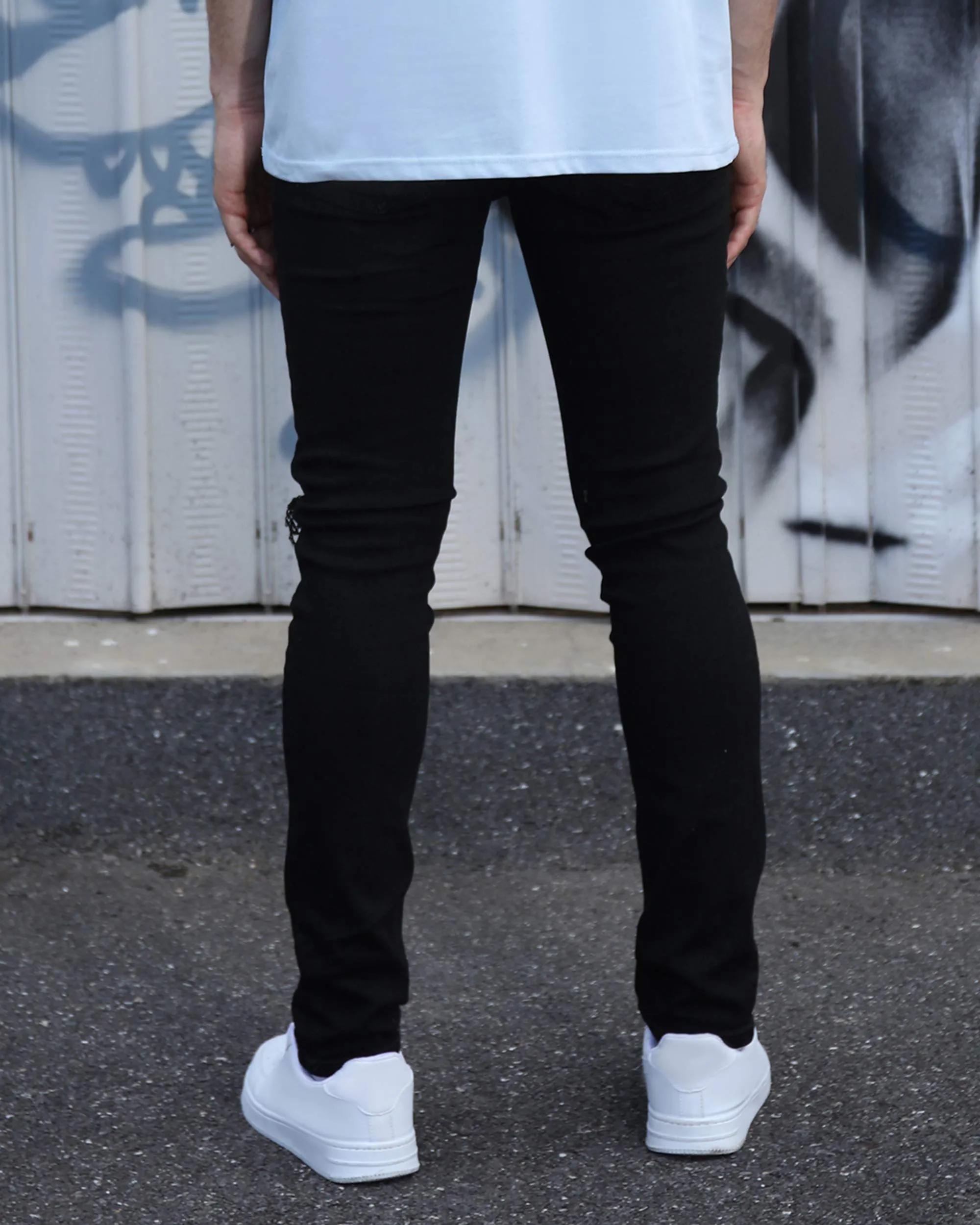 Hip Hop Black Ripped Jeans with Cashew Flower Patch