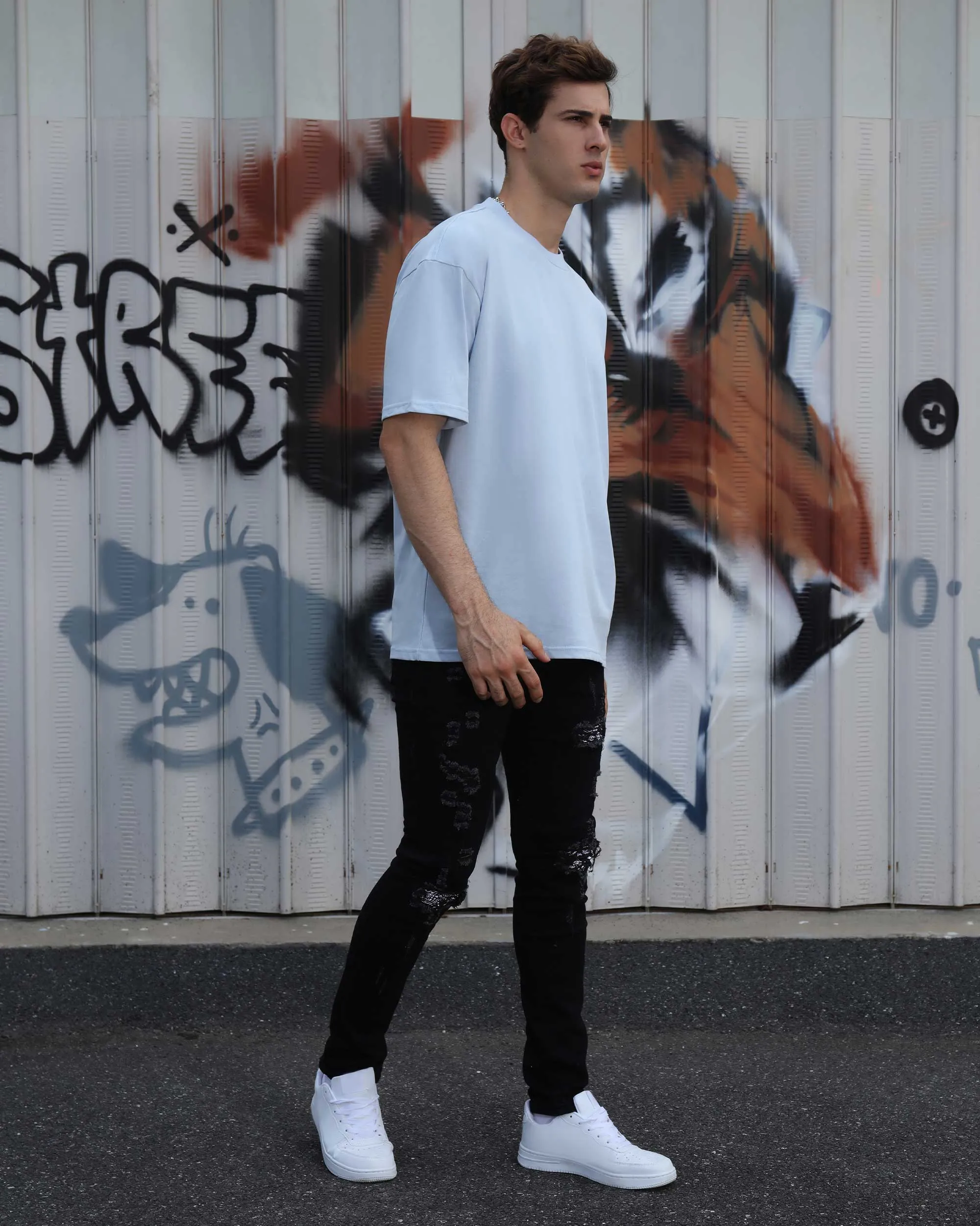 Hip Hop Black Ripped Jeans with Cashew Flower Patch