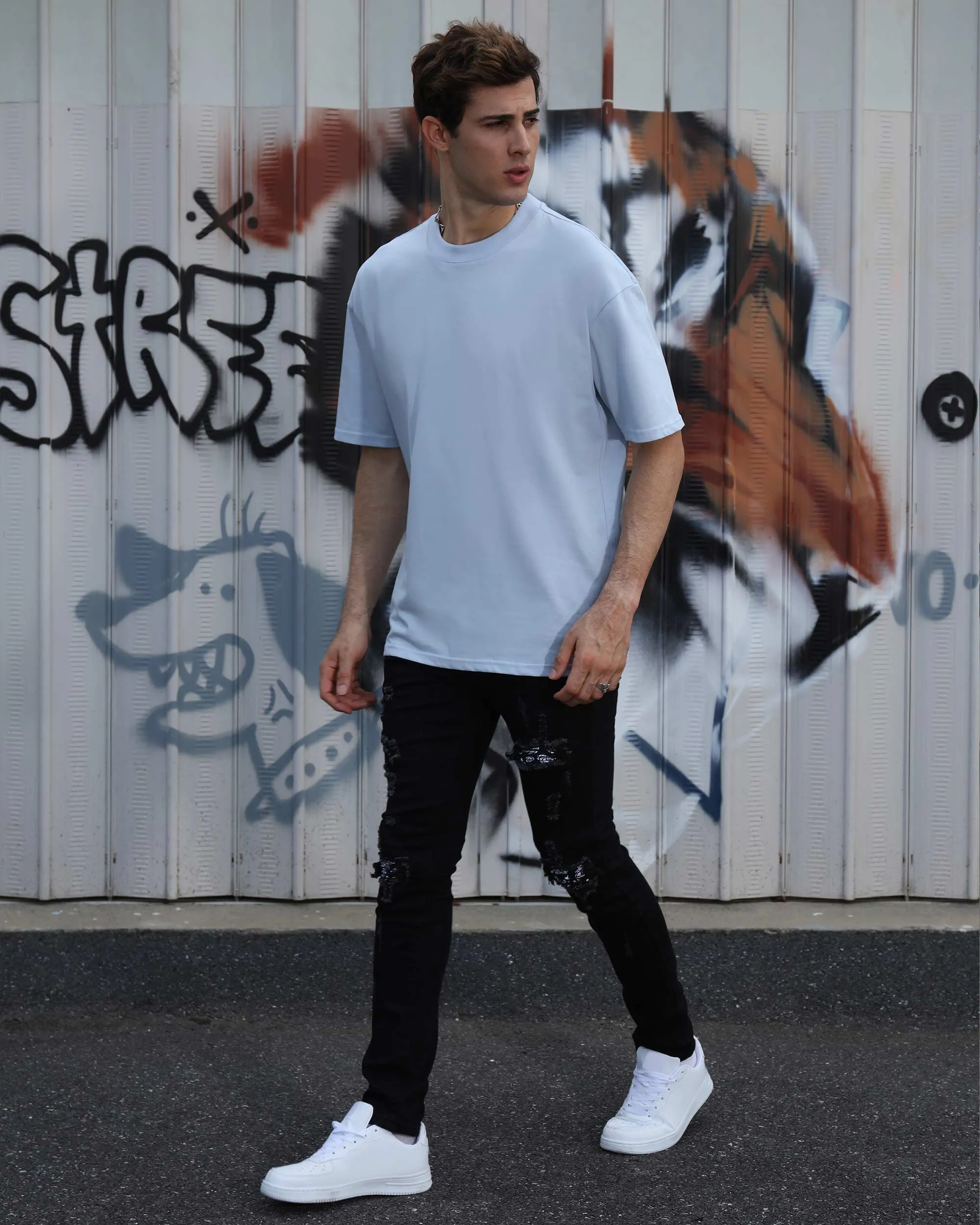 Hip Hop Black Ripped Jeans with Cashew Flower Patch
