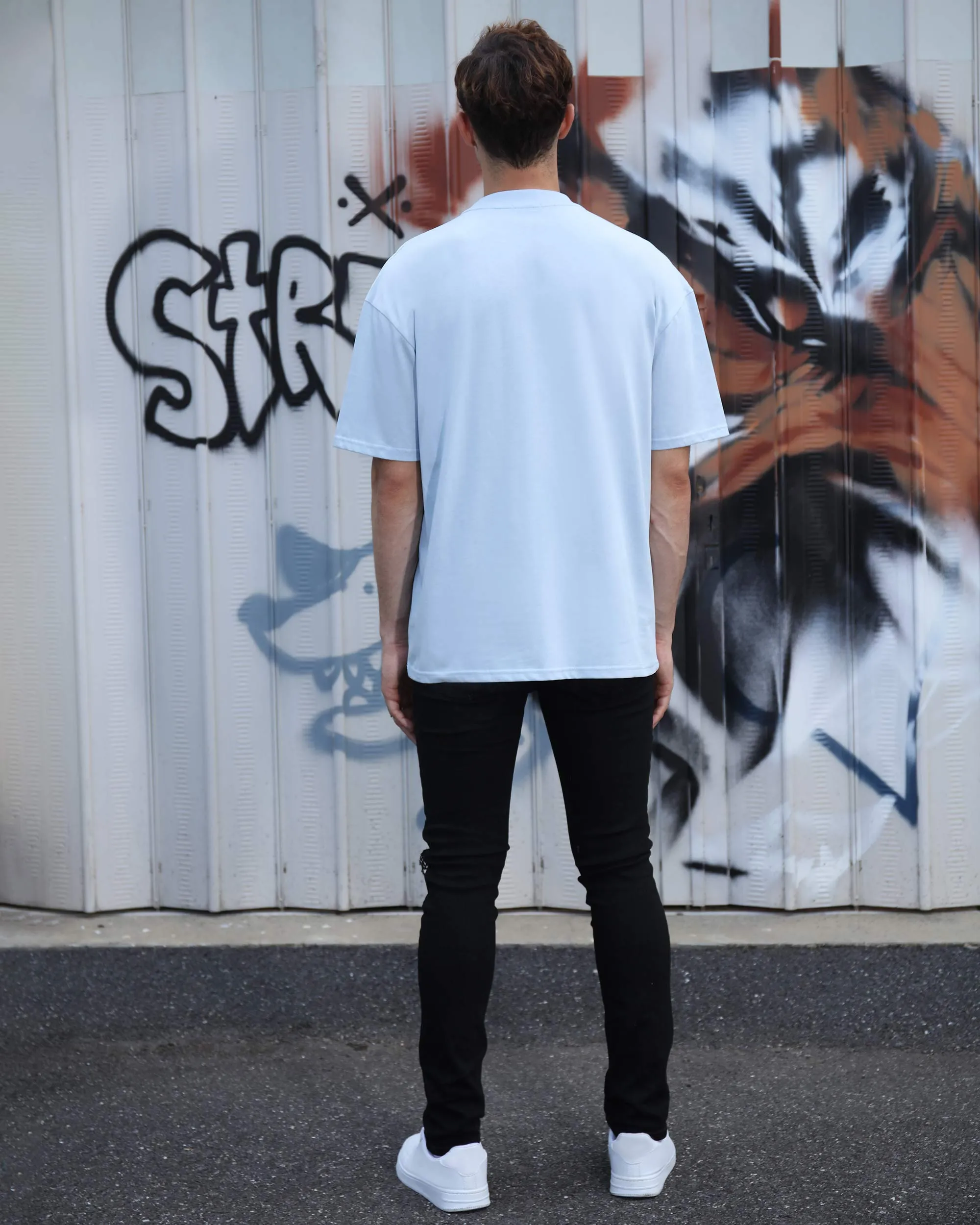 Hip Hop Black Ripped Jeans with Cashew Flower Patch