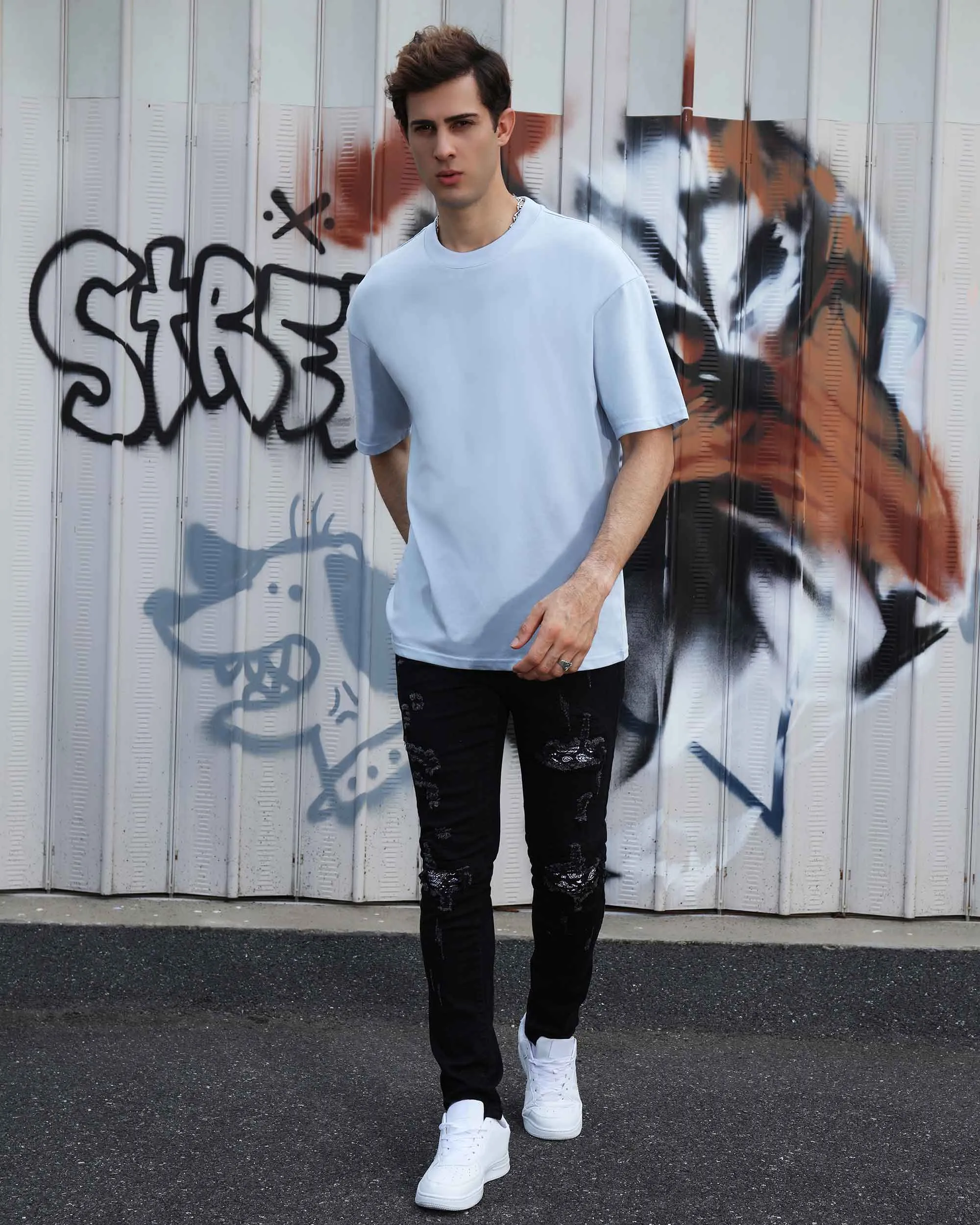Hip Hop Black Ripped Jeans with Cashew Flower Patch