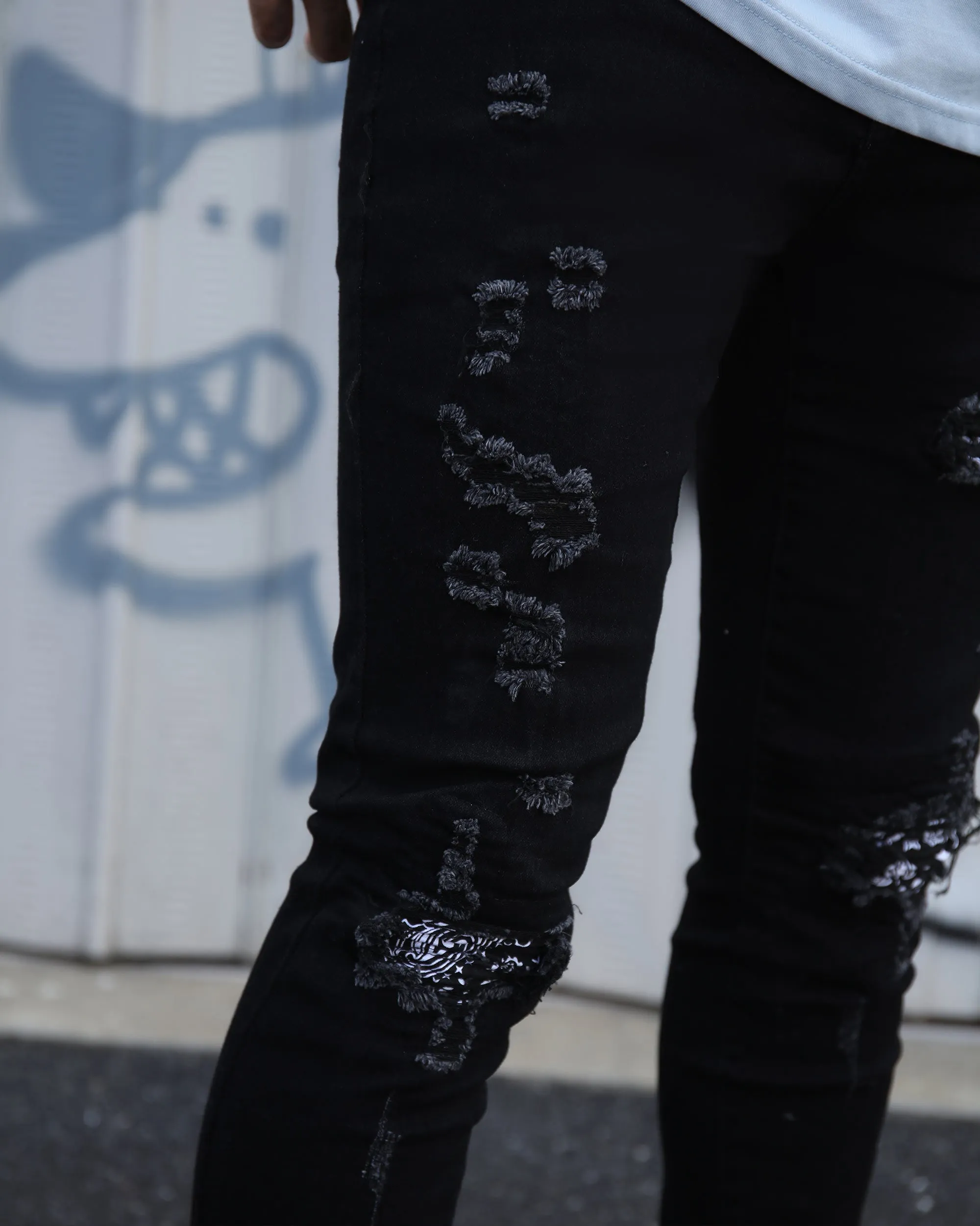 Hip Hop Black Ripped Jeans with Cashew Flower Patch