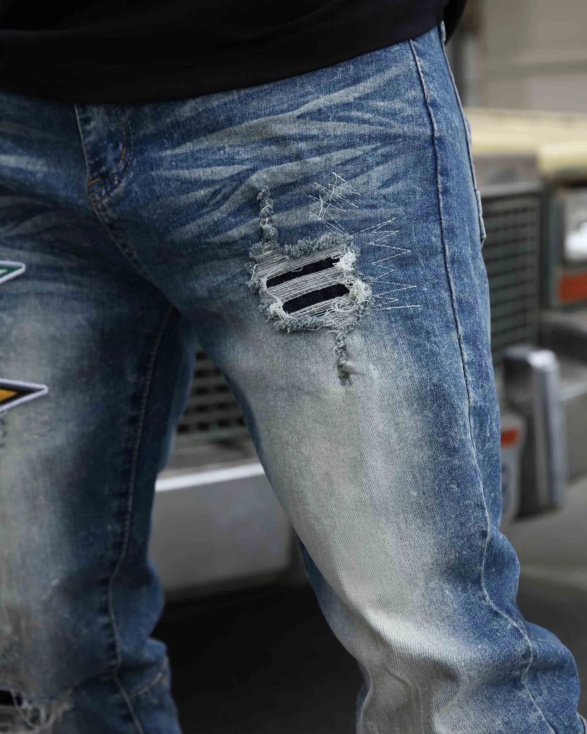 Medium Wash Blue Distressed Jeans with Flag Patch